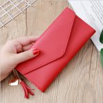 Wholesale Women Fashion Solid Color Flip Tassel Pendant Long Purses - Image 6