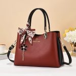 Wholesale Women Fashion Casual Contrast Color Ribbon Pendant Handbag Bag - Image 2