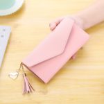 Wholesale Women Fashion Solid Color Flip Tassel Pendant Long Purses - Image 11