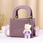 Women Fashion Casual Solid Color Rhombic Pattern Bear Pendat Handbag - Image 9