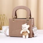 Women Fashion Casual Solid Color Rhombic Pattern Bear Pendat Handbag - Image 10