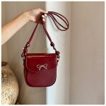 Wholesale Fashion Solid Color Bow Flip Mini Crossbody Bag - Image 2