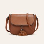 Wholesale Women Fashion Casual Solid Color Flip Saddle Tassel Shoulder Bag