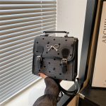 Wholesale Women Fashion Casual Printed Bowknot Buckle Canvas Backpack - Image 2