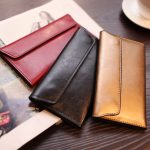 Wholesale Women Simple Solid Color Leather Long Purses