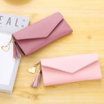 Wholesale Women Fashion Solid Color Flip Tassel Pendant Long Purses - Image 2