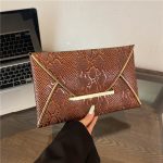 Wholesale Women Fashion Creative Contrast Color Snakeskin Pattern Purses