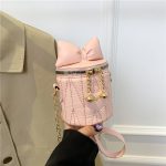 Wholesale Fashion Cute Mini Solid Color Bowknot Zipper Cylindrical Crossbody Bag - Image 3