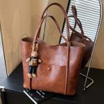 Wholesale Women Fashion Casual Retro Wax Leather Large Capacity Pendant Shoulder Bag