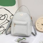 Wholesale Women Fashion Casual Solid Color Butterfly Label Decorative Backpack - Image 2