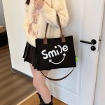 Wholesale Autumn And Winter Letters Contrast Canvas Shoulder Bag Women'S Large Capacity Casual Tote Bag Smiley Printed Canvas Bag - Image 2