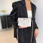 Wholesale Fashion Creative Solid Color Skull Crossbody Bag - Image 2
