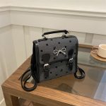 Wholesale Women Fashion Casual Printed Bowknot Buckle Canvas Backpack - Image 3