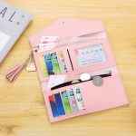 Wholesale Women Fashion Solid Color Flip Tassel Pendant Long Purses - Image 5