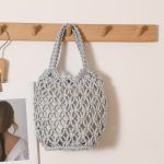 Stylish Woven Bucket Bag with Metallic Accents - Image 9