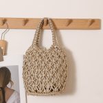 Stylish Woven Bucket Bag with Metallic Accents - Image 8