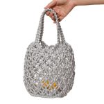 Stylish Woven Bucket Bag with Metallic Accents - Image 5